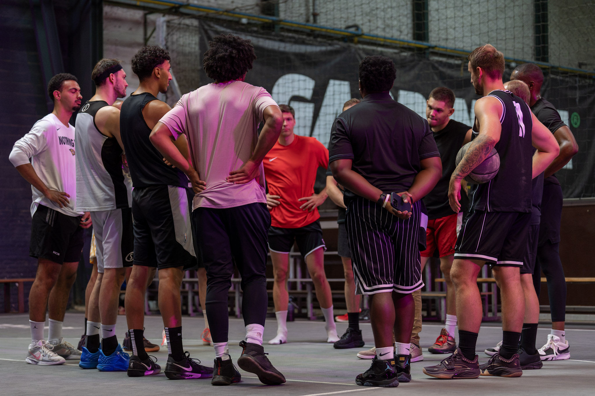 LINEAL players gathered together on the court